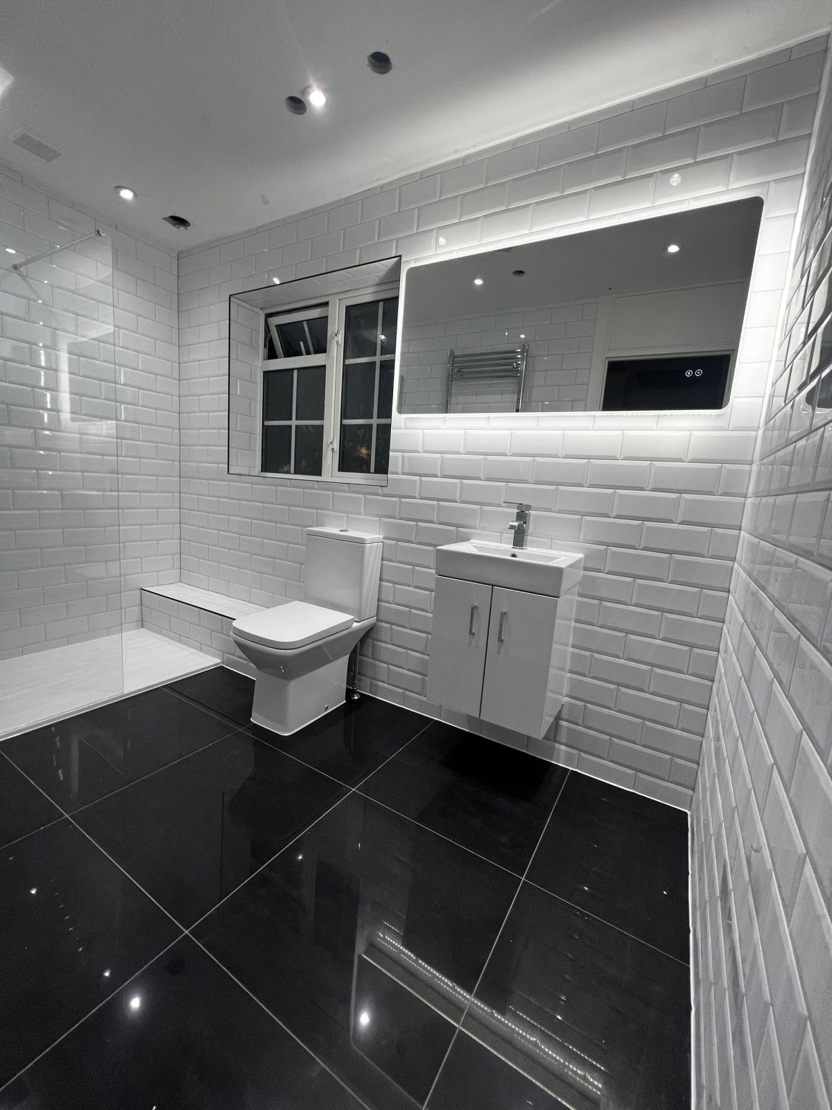 Completed bathroom with walk-in shower